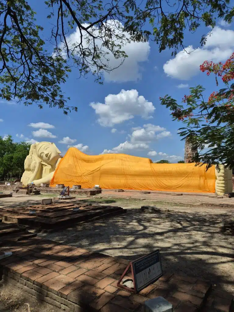 Giant outdoor reclining Buddha at Wat Lokayasutharam in Ayutthaya, Thailand.